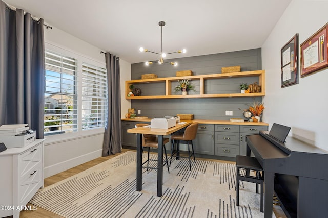 office area featuring light hardwood / wood-style flooring and a notable chandelier