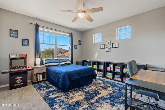 bedroom featuring carpet floors and ceiling fan