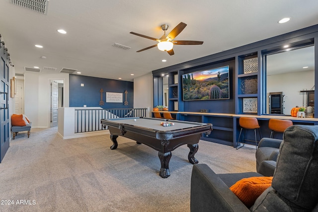 playroom with pool table, light colored carpet, and ceiling fan