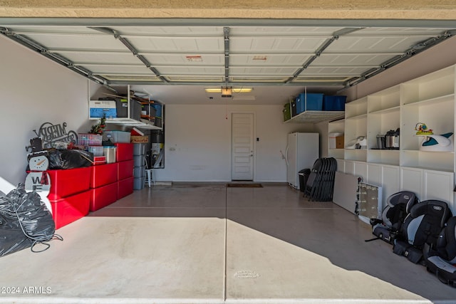 garage with white fridge