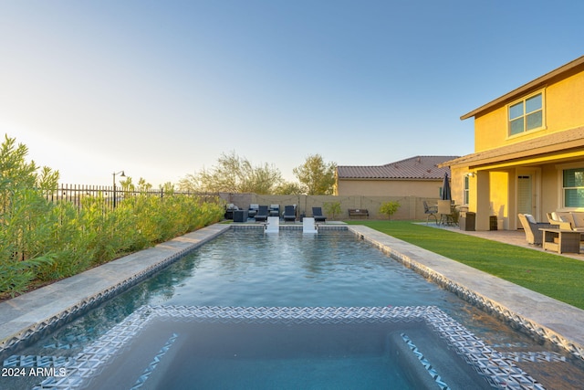 view of swimming pool with outdoor lounge area and a patio area