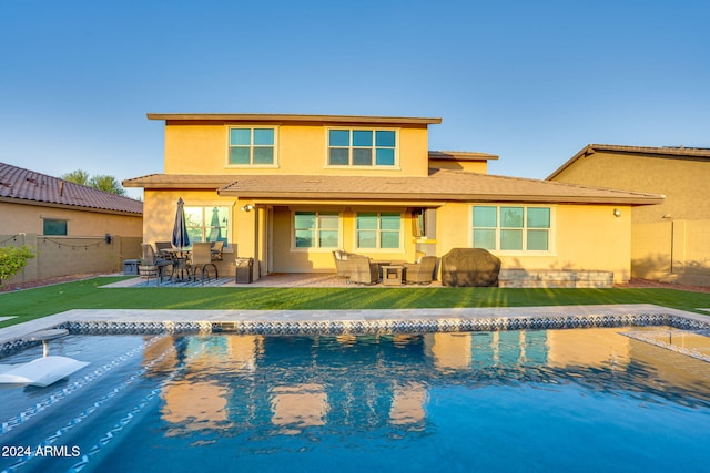 rear view of property with a patio area