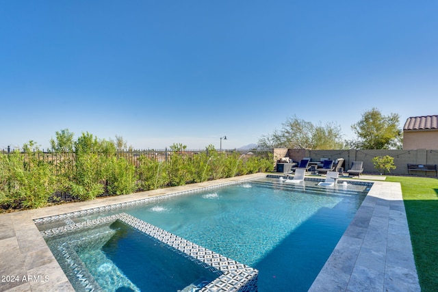 view of pool with a patio and an outdoor hangout area