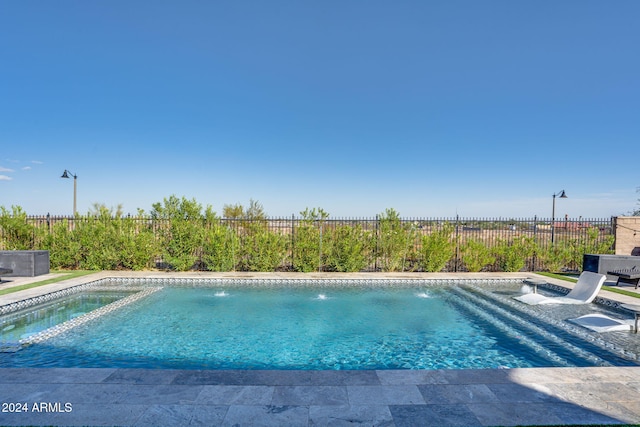 view of pool featuring pool water feature