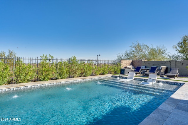 view of swimming pool featuring pool water feature