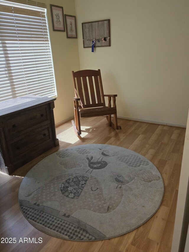 2125 E Danbury Rd, Phoenix, AZ 85022 - living area with wood finished floors and baseboards