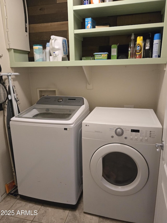 2125 E Danbury Rd, Phoenix, AZ 85022 - washroom featuring separate washer and dryer and light tile patterned floors