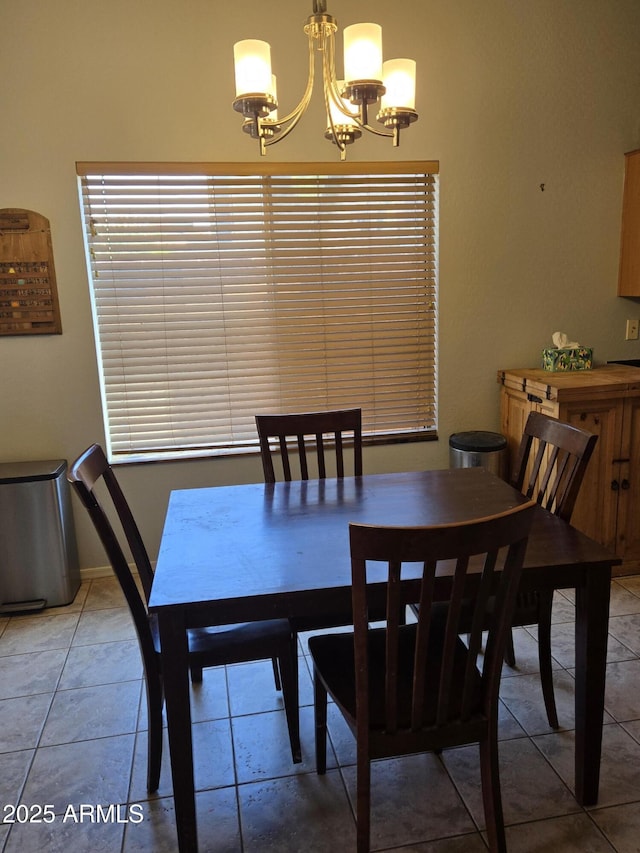 2125 E Danbury Rd, Phoenix, AZ 85022 - dining room with a chandelier and light tile patterned floors