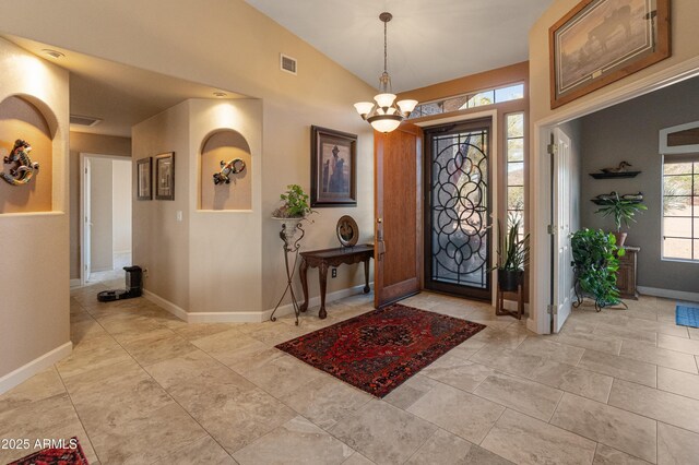 43638 N 22nd St, New River, AZ 85087 - entrance foyer with a chandelier, baseboards, and vaulted ceiling