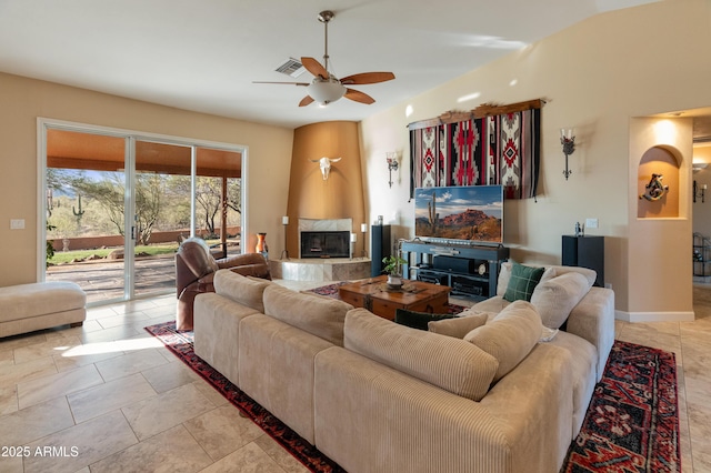 43638 N 22nd St, New River, AZ 85087 - living room with a ceiling fan and a premium fireplace