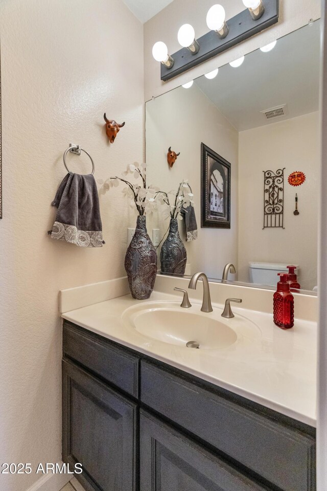 43638 N 22nd St, New River, AZ 85087 - half bath featuring vanity and toilet