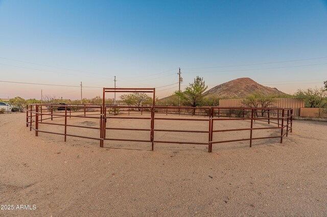 43638 N 22nd St, New River, AZ 85087 - yard at dusk featuring an enclosed horse arena