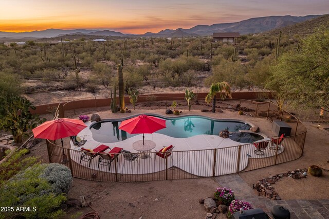 43638 N 22nd St, New River, AZ 85087 - view of swimming pool with a mountain view, a patio area, and a pool with connected hot tub