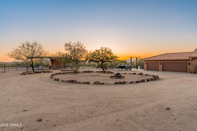 43638 N 22nd St, New River, AZ 85087 - view of yard featuring dirt driveway and a garage