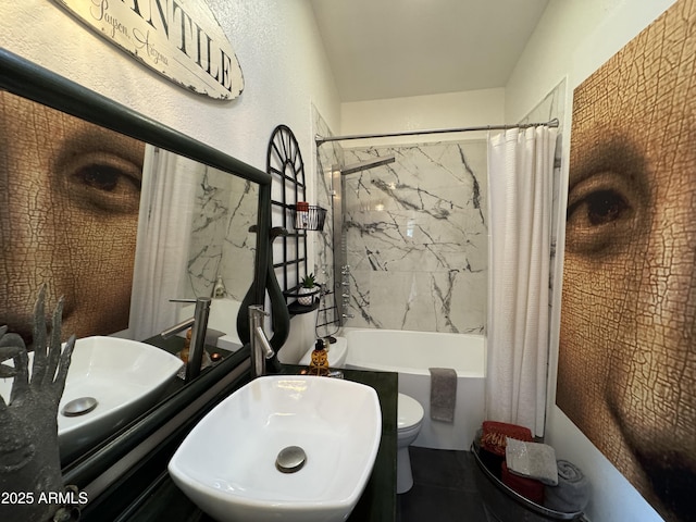 full bathroom featuring sink, toilet, and shower / bathtub combination with curtain