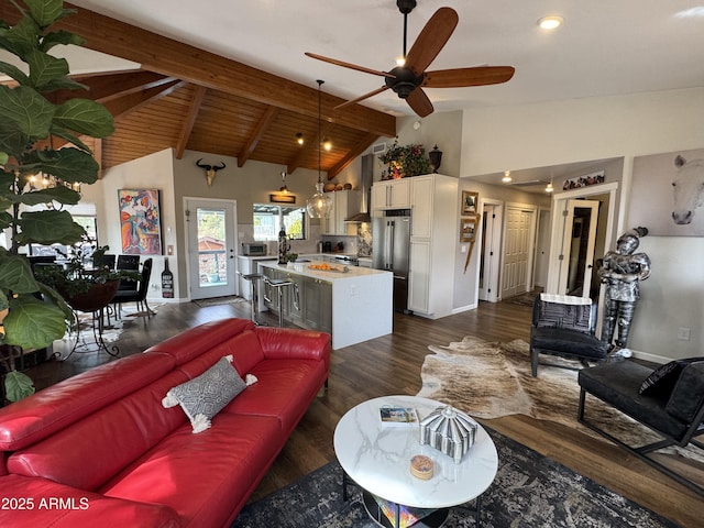 living room featuring ceiling fan, beamed ceiling, dark wood-type flooring, and high vaulted ceiling