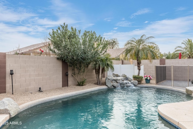 view of pool with pool water feature