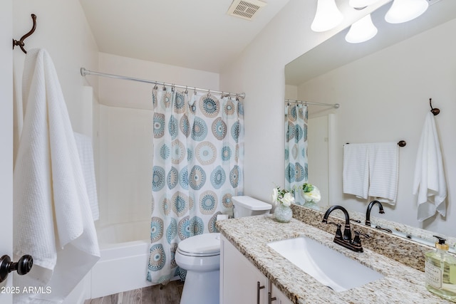 full bathroom with shower / bathtub combination with curtain, vanity, toilet, and wood-type flooring