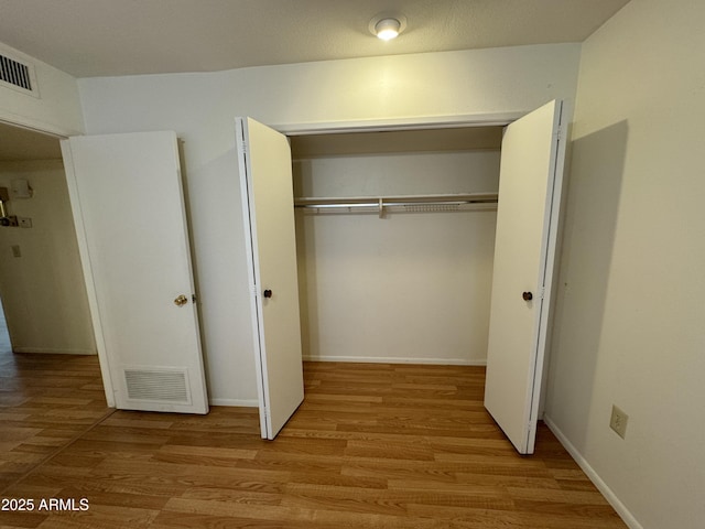 closet featuring visible vents