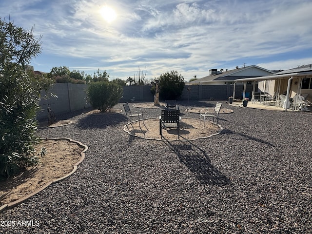 view of yard featuring a fenced backyard and a patio