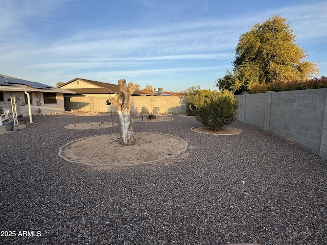 view of yard with a patio area and a fenced backyard