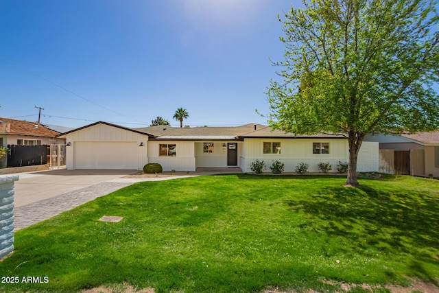 ranch-style home with concrete driveway, an attached garage, fence, a front lawn, and brick siding