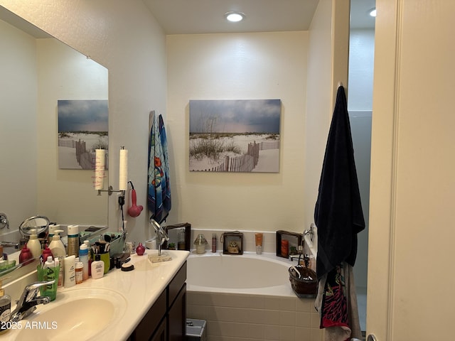 24645 W Atlanta Ave, Buckeye, AZ 85326 - full bathroom with a bath, vanity, and recessed lighting