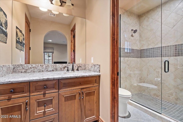 9514 E Madera Dr, Scottsdale, AZ 85262 - bathroom with a shower stall, vanity, visible vents, and toilet