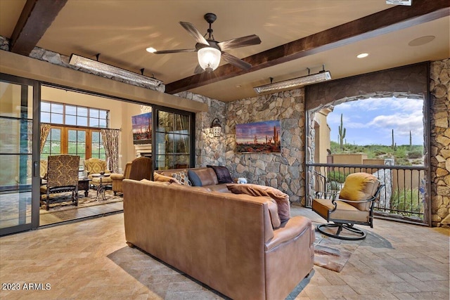 9514 E Madera Dr, Scottsdale, AZ 85262 - living area featuring beamed ceiling, ceiling fan, and plenty of natural light