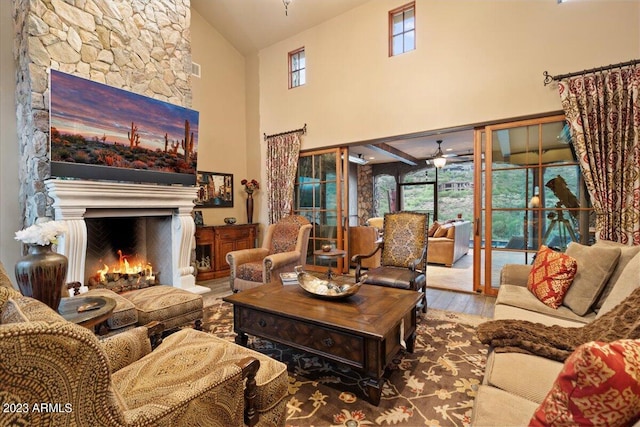 9514 E Madera Dr, Scottsdale, AZ 85262 - living room with a ceiling fan, high vaulted ceiling, wood finished floors, and a fireplace