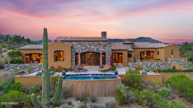 9514 E Madera Dr, Scottsdale, AZ 85262 - rear view of property with a patio, stucco siding, a chimney, and a tile roof