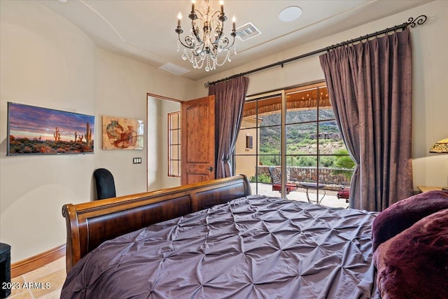 9514 E Madera Dr, Scottsdale, AZ 85262 - bedroom featuring visible vents, access to outside, and a notable chandelier