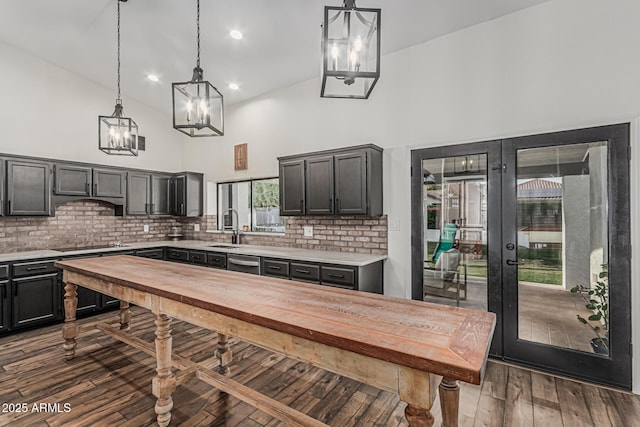 5602 W Alameda Rd, Glendale, AZ 85310 - kitchen featuring a sink, a chandelier, dishwasher, french doors, and high vaulted ceiling