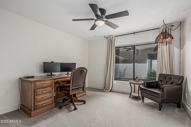 5602 W Alameda Rd, Glendale, AZ 85310 - home office featuring light carpet, baseboards, and ceiling fan