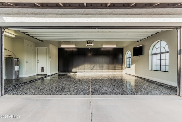 5602 W Alameda Rd, Glendale, AZ 85310 - garage with water heater and baseboards