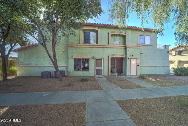 view of front of property with central AC unit