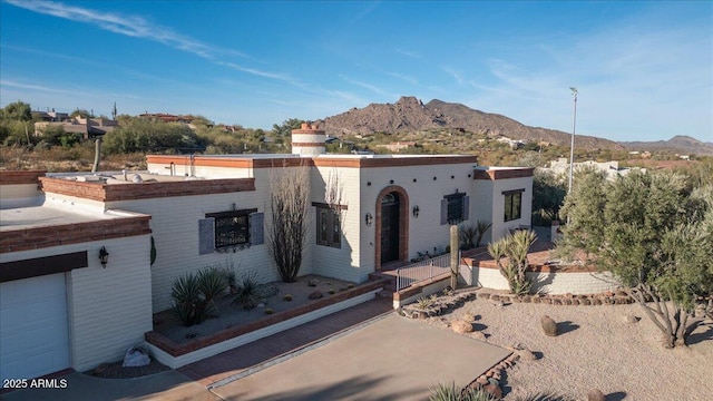 view of front of house with a mountain view