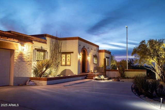 view of front of home featuring a garage