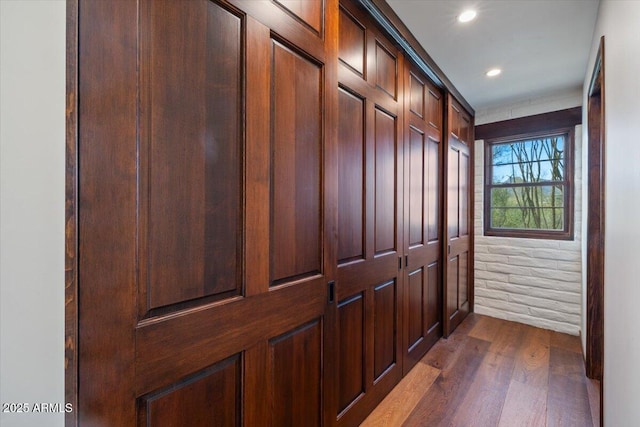 hallway featuring dark hardwood / wood-style floors