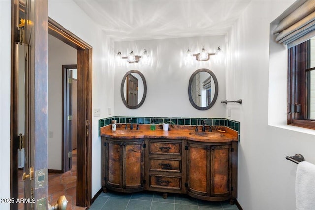 bathroom with tile patterned flooring and vanity