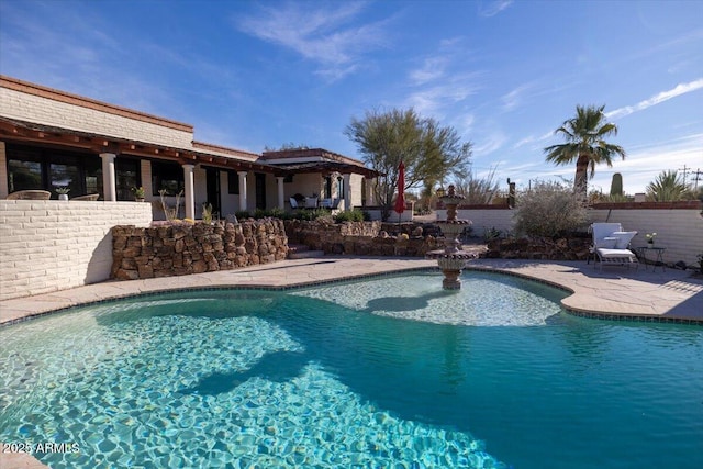 view of pool with a patio area