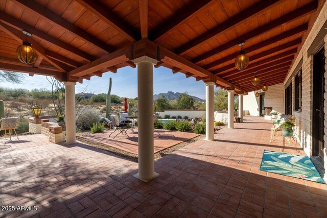 view of patio featuring a mountain view