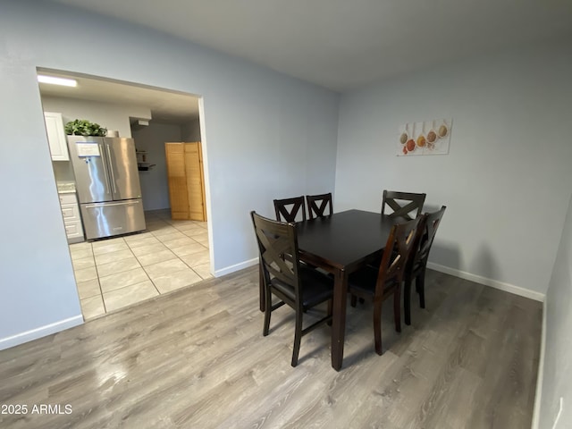 dining room featuring light hardwood / wood-style flooring