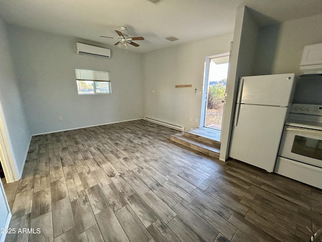 kitchen with hardwood / wood-style floors, ceiling fan, white appliances, and a baseboard heating unit