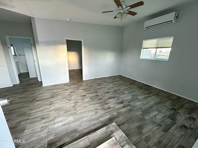 empty room with a wall mounted AC and ceiling fan