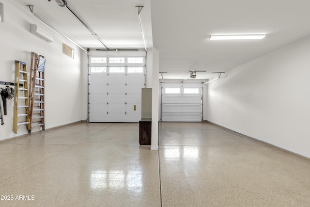 garage featuring baseboards