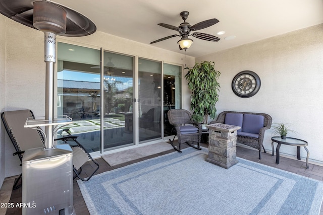 view of patio / terrace with a ceiling fan