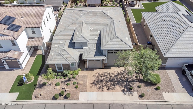 birds eye view of property with a residential view