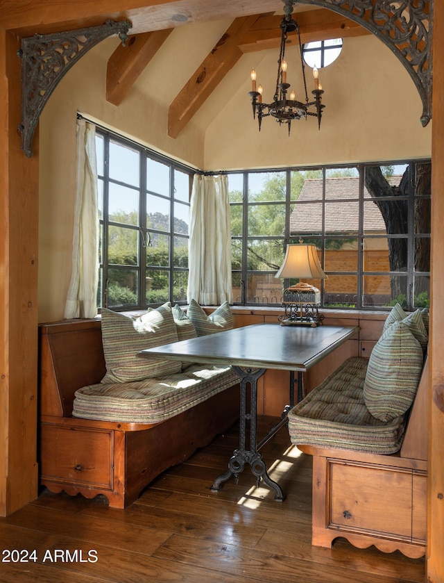 dining space with breakfast area, beam ceiling, a chandelier, and hardwood / wood-style flooring