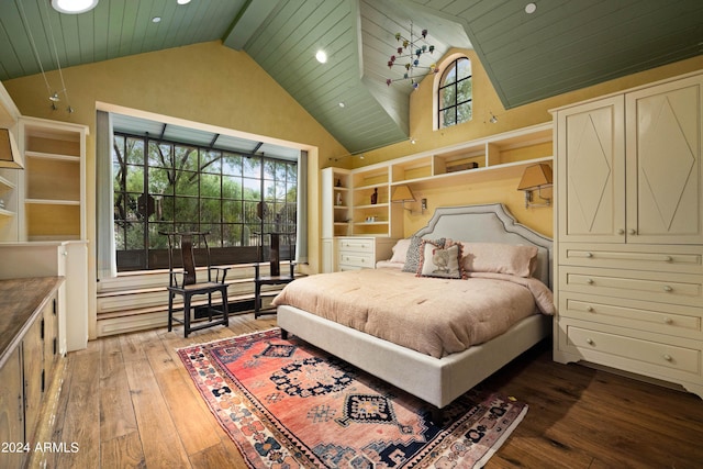 bedroom with multiple windows, wood-type flooring, wooden ceiling, and access to exterior